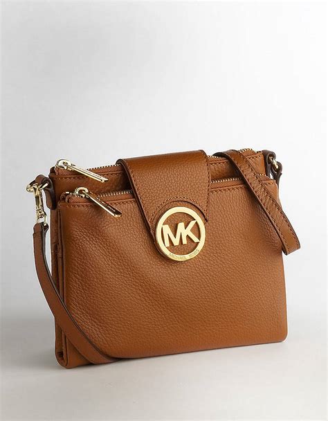 michael kors crossbody black and brown|Michael Kors brown leather handbag.